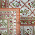Close up of coral white Jaipur jaal floral hand block print pattern on 100% cotton bed sheet