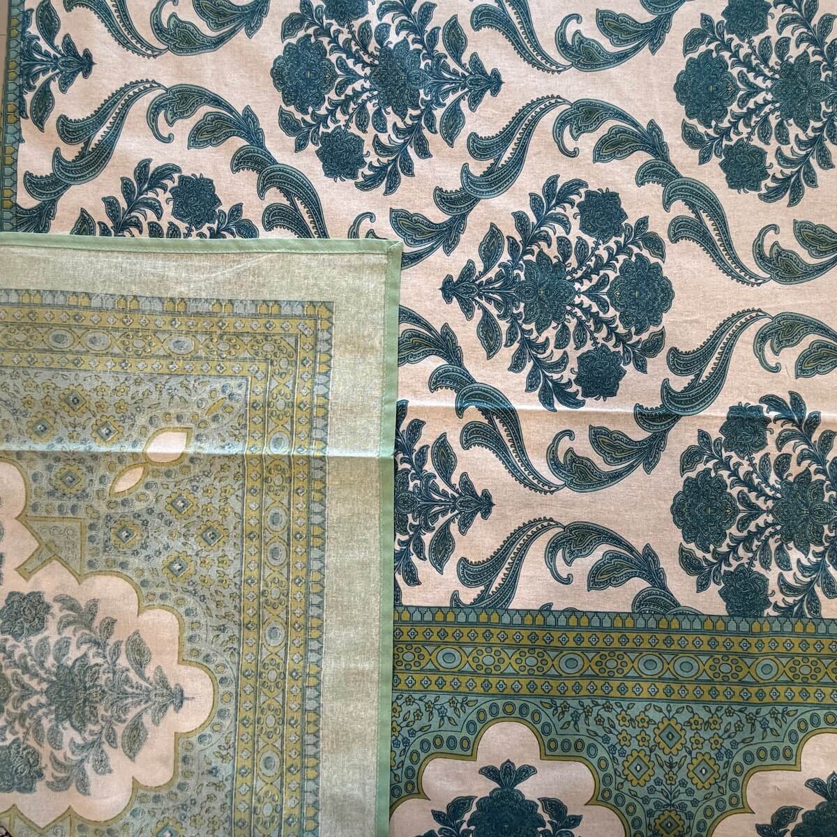 Close up of sea green Jaipur damask hand block print pattern on 100% cotton bed sheet