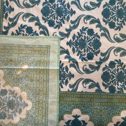 Close up of sea green Jaipur damask hand block print pattern on 100% cotton bed sheet
