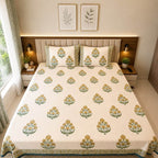 Cream blue Jaipur boota floral block printed cotton king size bed sheet set styled on bed 108x108 inch